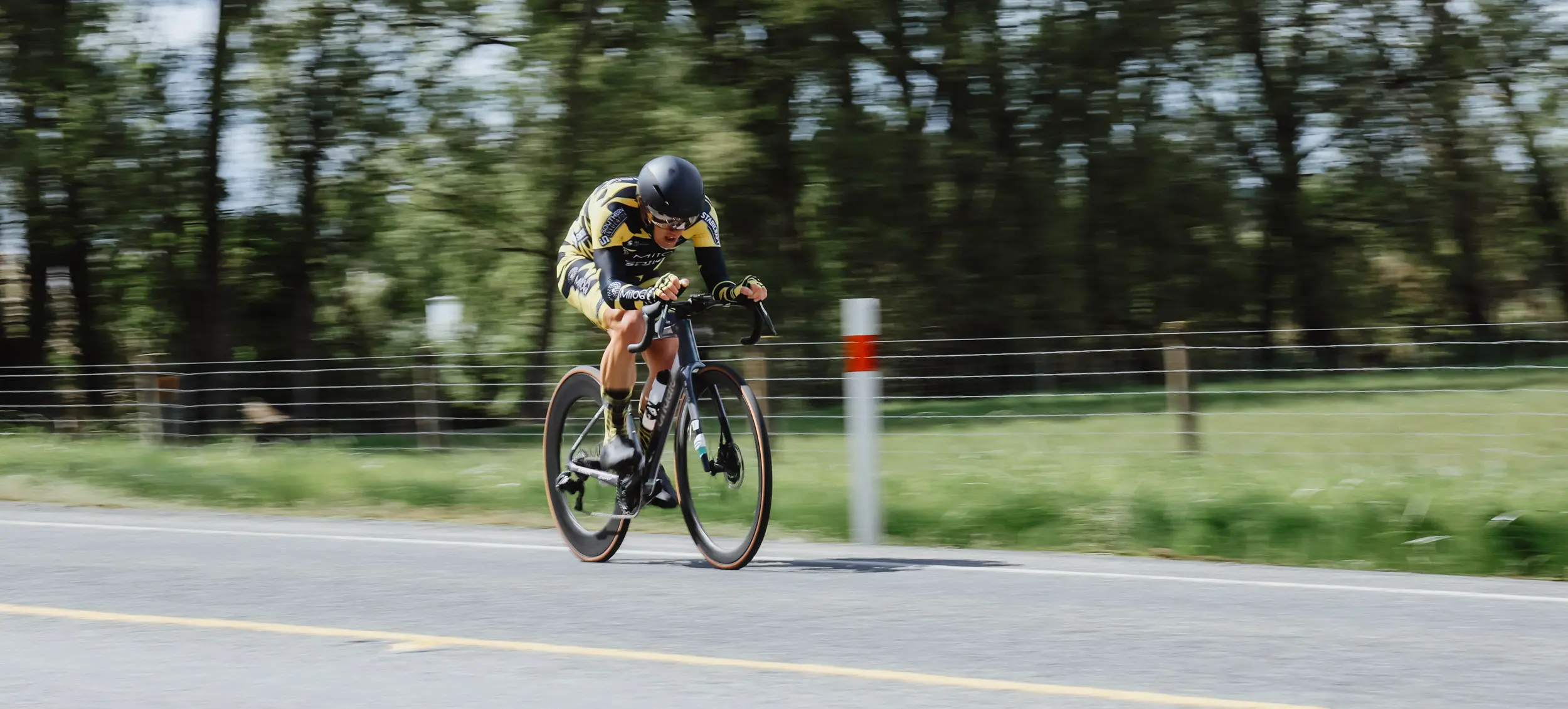 Road cyclist in time trial position